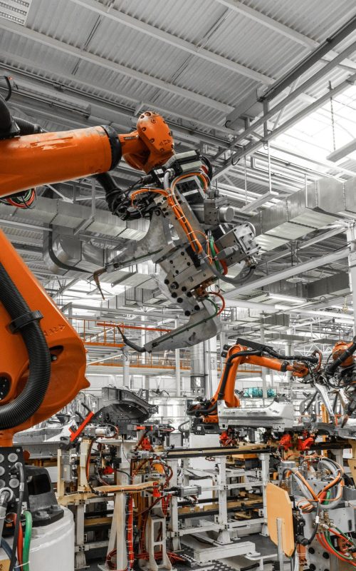 Photo of automobile production line. Welding car body. Modern car assembly plant. Auto industry Photo of automobile production line. Welding car body. Modern car assembly plant. Auto industry.